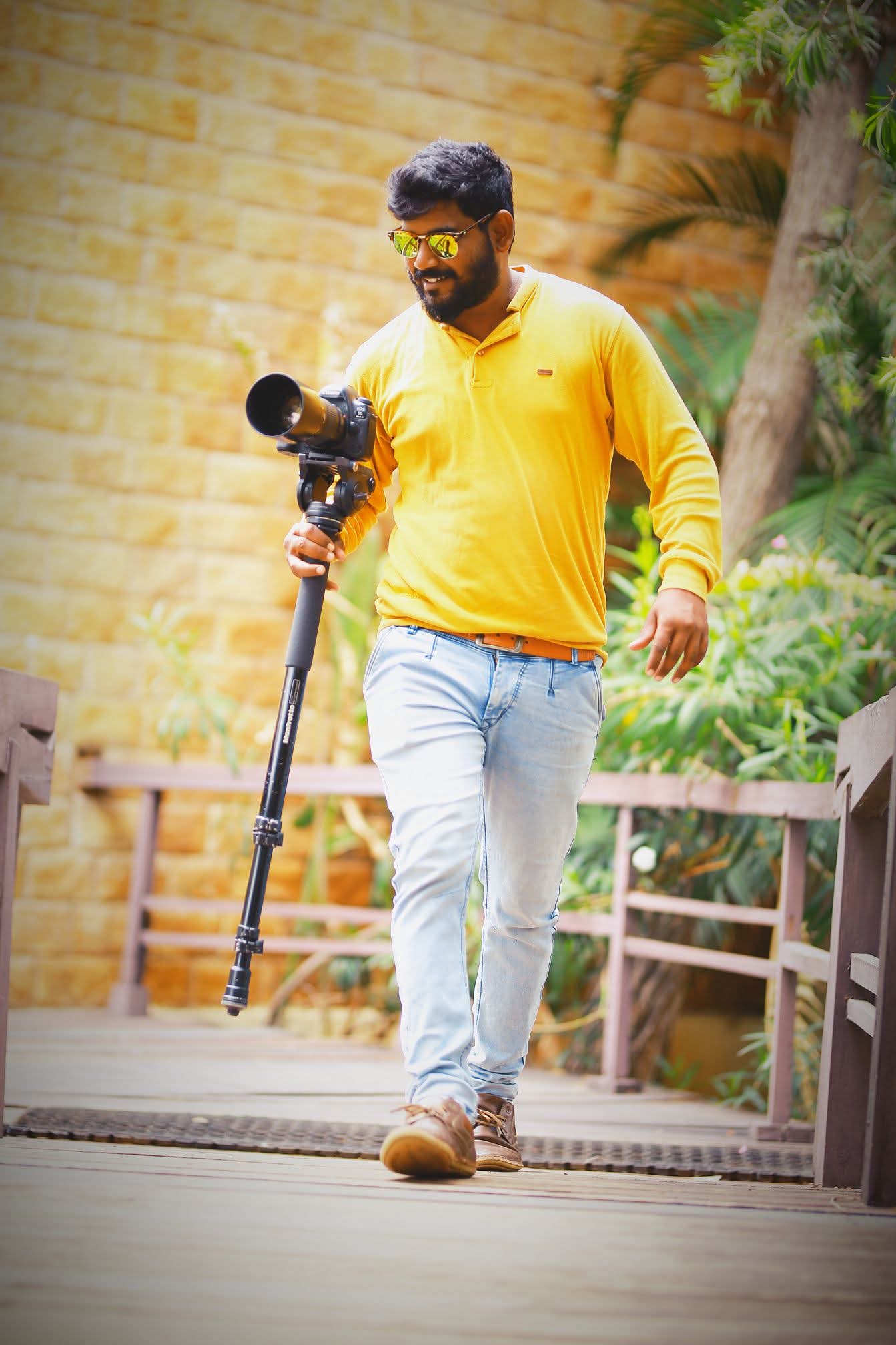 Krishna walking with his camera